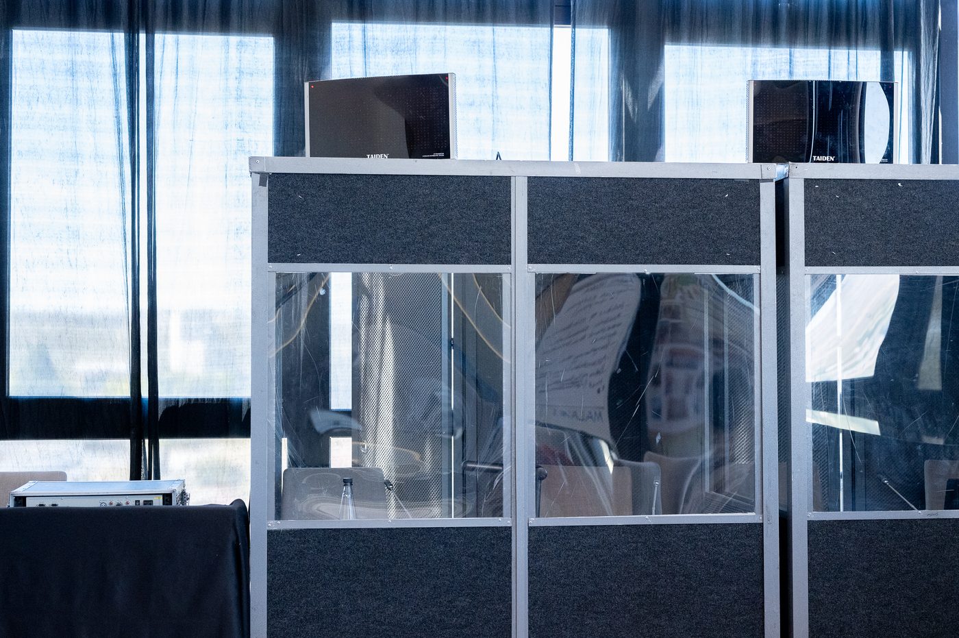 Row of interpretation booths with Taiden IR transmitters mounted on top, ready for a multilingual event